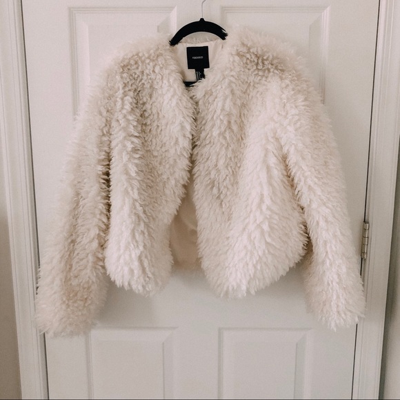 white fuzzy coat